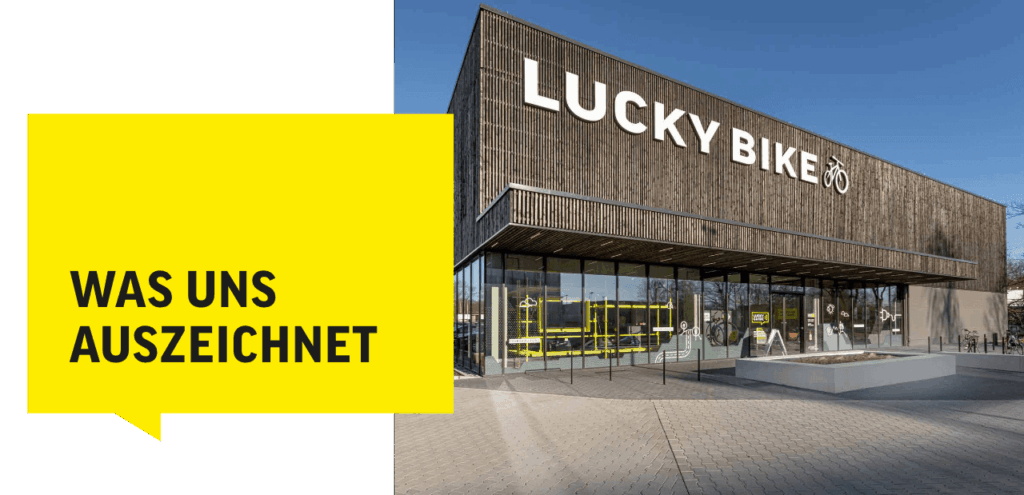 Lucky Bike Storefront mit gelbem Banner "Was uns auszeichnet", präsentiert E-Bike-Guide und Markenwerte.